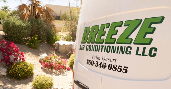 Back Breeze Air Conditioning LLC van in driveway